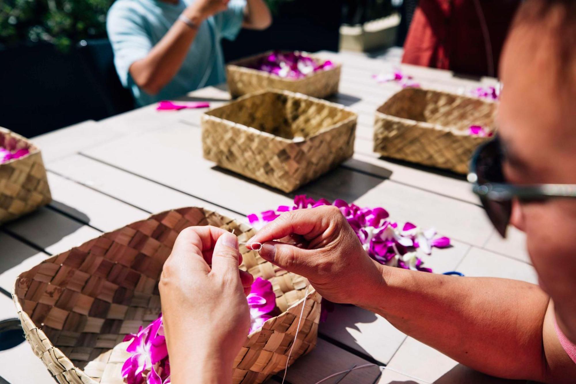 Aston Waikiki Beach Tower Honolulu Exterior photo Lei making